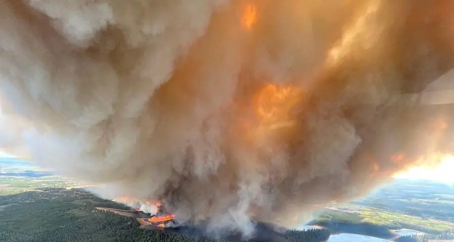 Fire and floods across western Canada force evacuations