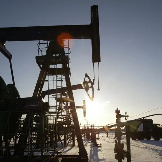 Oil stable as planned output cuts start to materialise