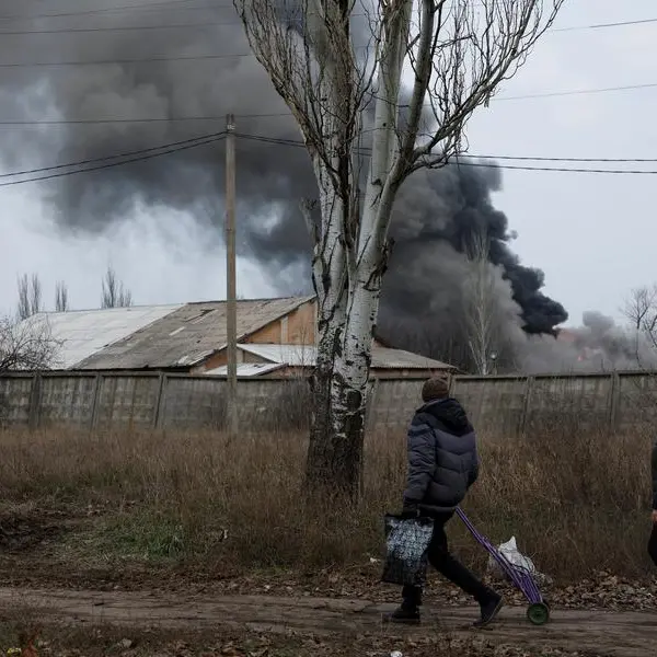 Russian missiles rain down on Ukraine towns as Putin says he is open to talks