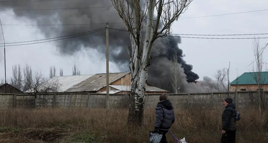 Russian missiles rain down on Ukraine towns as Putin says he is open to talks