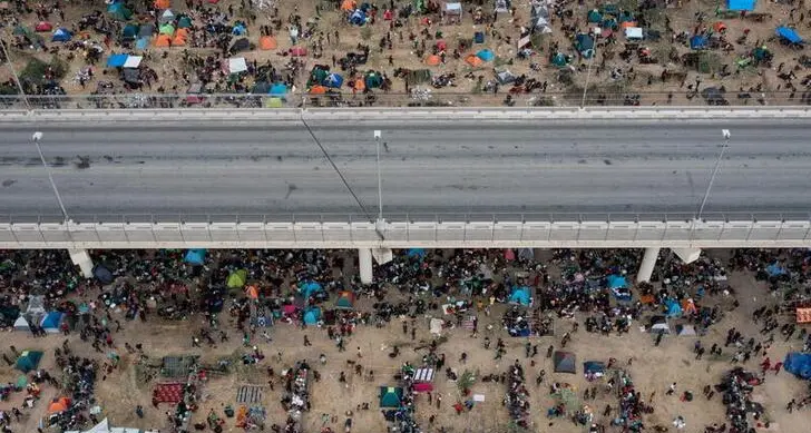 U.S. removing migrants from Texas border camp, begins flights to Haiti