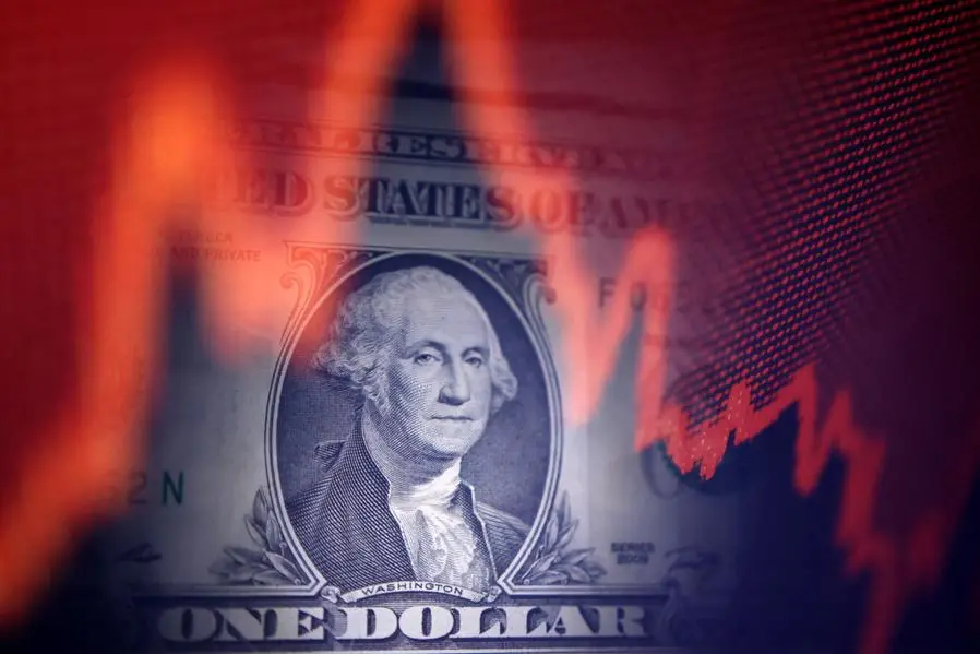 U.S. dollar banknote and stock graph are seen in this illustration taken April 25, 2025. REUTERS/Dado Ruvic/Illustration. , Reuters
