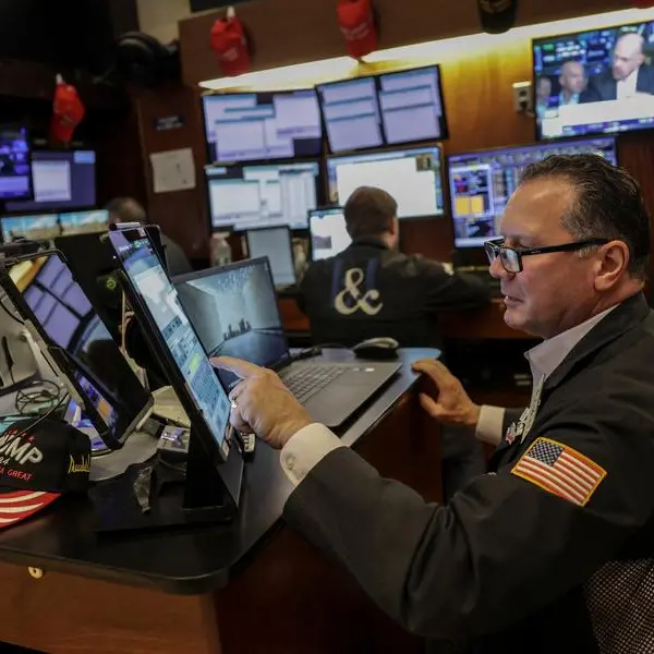 Asia shares struggle, dollar soars on lowered Fed rate cut bets