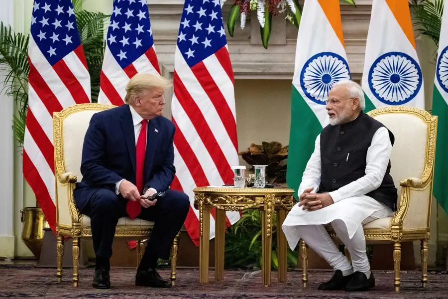 FILE PHOTO: Indian Prime Minister Narendra Modi speaks to U.S. President Donald Trump during a meeting at Hyderabad House in New Delhi, India, February 25, 2020. REUTERS/Al Drago. Image used for illustrative purpose. , Reuters