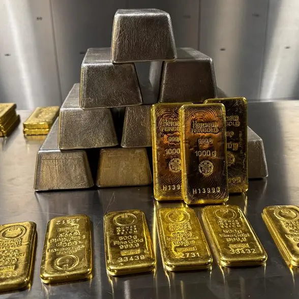 Gold and silver rise from near one-week lows on bargain-hunting