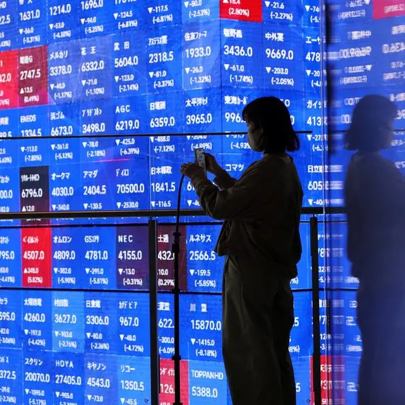 Stocks sink, oil surges as Trump vows to keep hitting Iran