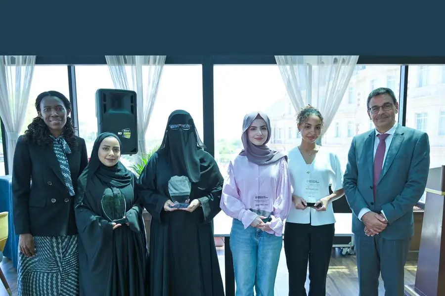 Program interns with WCM-Q\\u2019s Tembela Eweje and Dr. Khaled Machaca at the graduation luncheon. Image Courtesy: Weill Cornell Medicine-Qatar