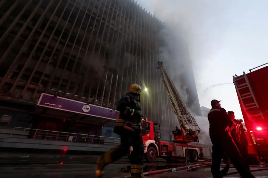 Firefighters work to extinguish a fire that erupted in a telecommunications building in the Ramses district of downtown Cairo, Egypt July 7, 2025. REUTERS/Amr Abdallah Dalsh , Reuters/REUTERS