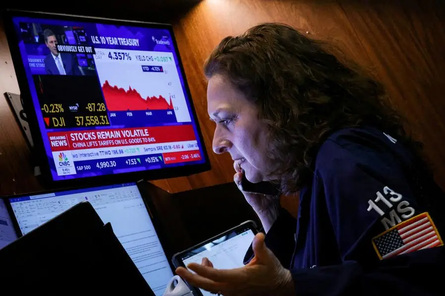 A trader works on the floor at the New York Stock Exchange (NYSE) in New York City, U.S., April 9, 2025. REUTERS/Brendan McDermid. , Reuters