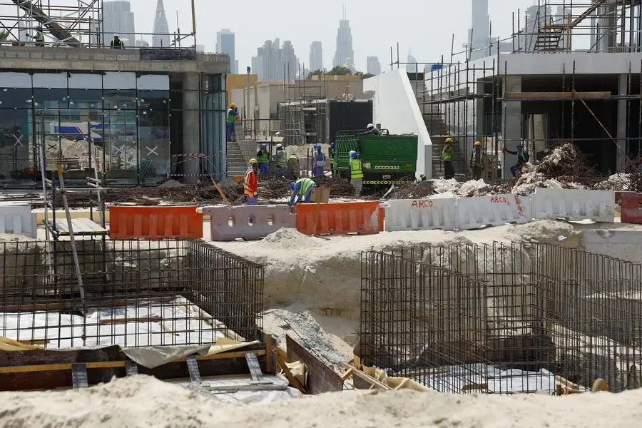 <p>Workers work at a construction site - August 15, 2023. REUTERS/Rula Rouhana</p>\\n , Reuters