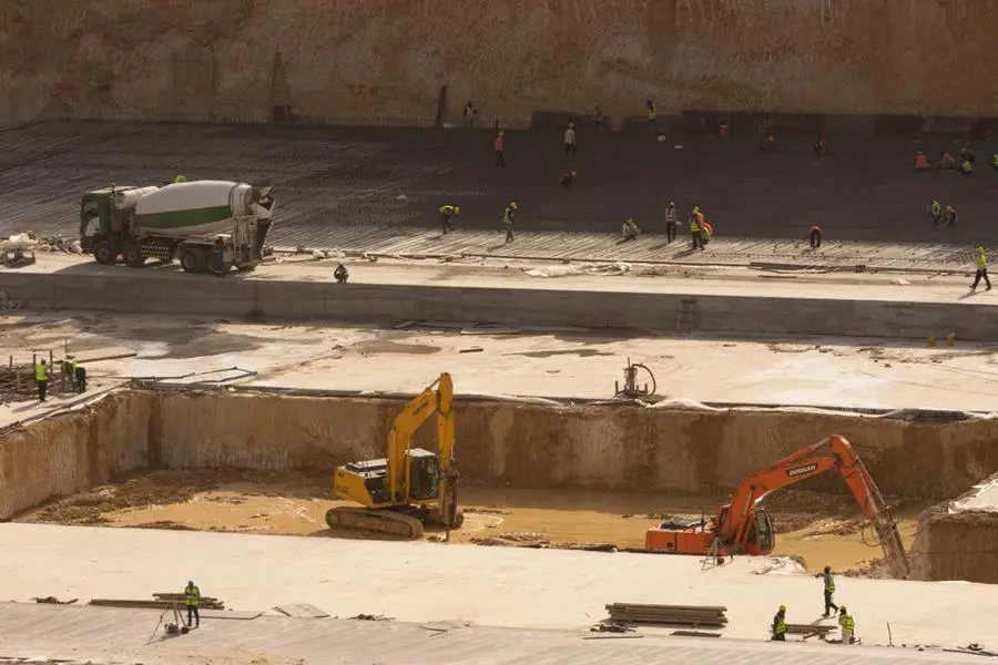 Riyadh, Saudi Arabia, KSA - March 5, 2020 construction work in new building being constructed in north of Riyadh with excavator diggers engineers and workers. Image used for illustrative purpose. Getty Images , Getty Images