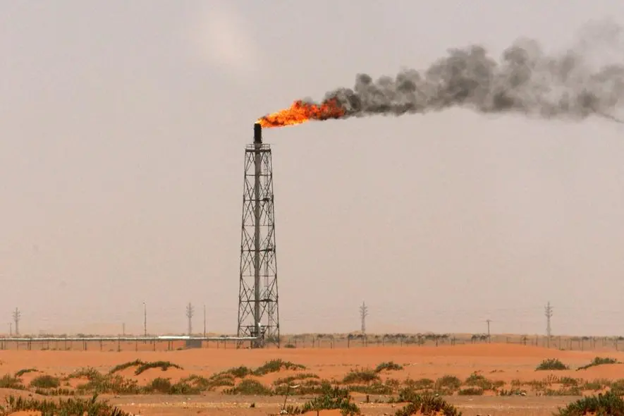 FILE PHOTO: A gas flame is seen in the desert near the Khurais oilfield, about 160 km (99 miles) from Riyadh, June 23, 2008. REUTERS/Ali Jarekji. Image used for illustrative purpose. , Reuters