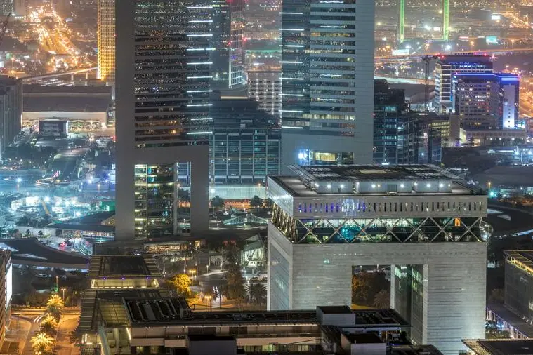 Skyline view of the buildings of Sheikh Zayed Road and DIFC night in Dubai, UAE. Illuminated skyscrapers in financial centre aerial view from above. Image Courtesy: Getty Images/iStockphoto