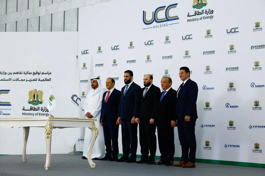 Syrian President Ahmed al-Sharaa attends the signing ceremony of a memorandum of understanding between the Ministry of Energy and Qatar\\'s UCC Holding, with the aim of promoting investment in the energy sector, in Damascus, Syria, May 29, 2025. REUTERS/Yamam Al Shaar. , Reuters