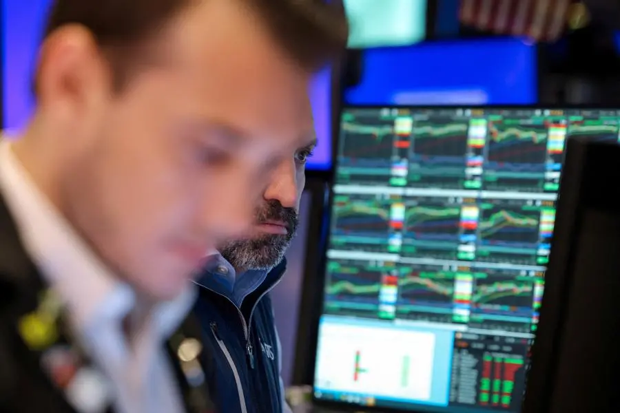 Traders work on the floor at the New York Stock Exchange (NYSE) in New York City, U.S., May 13, 2025. REUTERS/Brendan McDermid. , Reuters