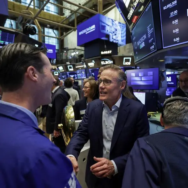 World stocks hold near record highs, oil keeps below $100 on peace deal hopes