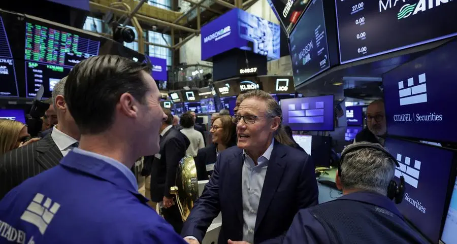 World stocks hold near record highs, oil keeps below $100 on peace deal hopes