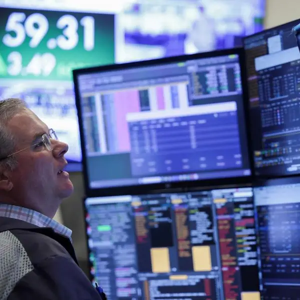 World stocks hold near record highs, oil keeps below $100 on peace deal hopes