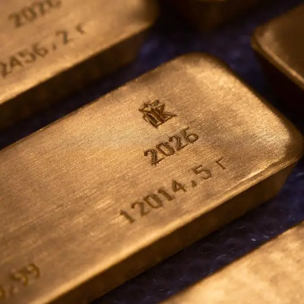 Gold slips to two-week low as Fed rate-hike bets buoy dollar