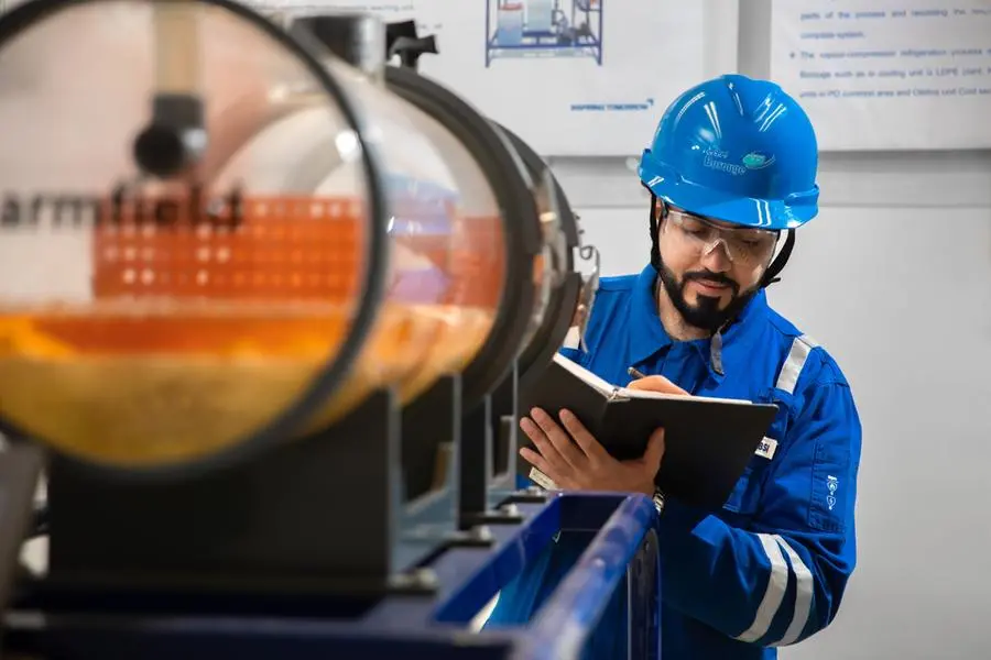Borouge Employee at Al Ruwais Industrial City. Borouge reports 22% Q3 2023 net profit increase. Image Courtesy: Borouge