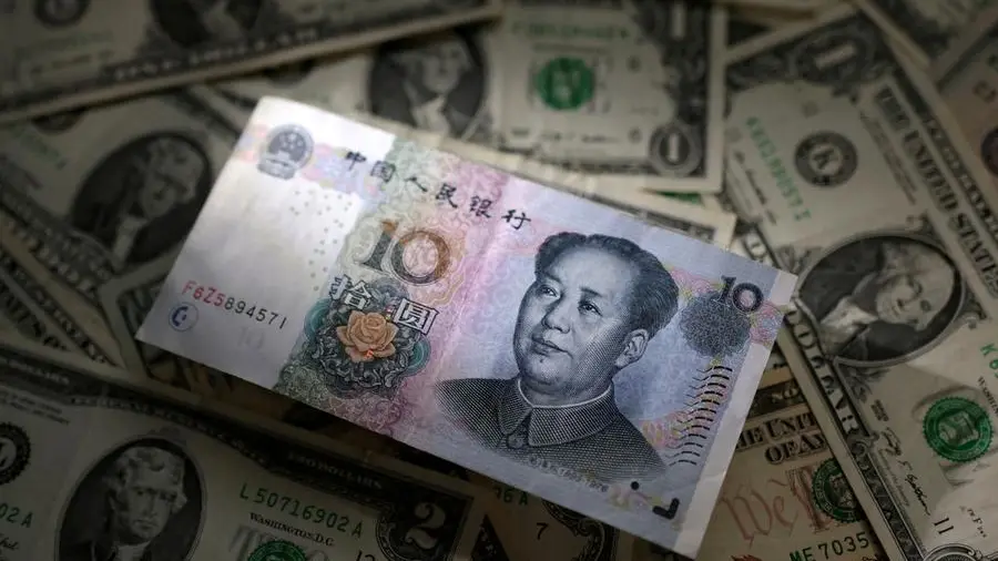Yuan edges down as firmer dollar, Middle East tensions weigh