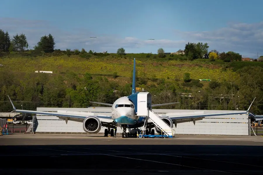 A Boeing 737 MAX 8, the first jet intended for use by a Chinese airline to be returned to its manufacturer, sits parked at Boeing Field, as trade tensions escalate over U.S. tariffs with China, in Seattle, Washington, U.S. April 22, 2025. REUTERS/David Ryder. , Reuters