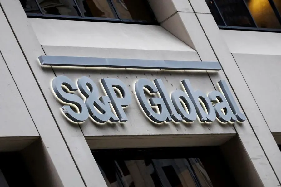 FILE PHOTO: FILE PHOTO: The S&P Global logo is displayed on its offices in the financial district in New York City, U.S., December 13, 2018. REUTERS/Brendan McDermid/File Photo. , Reuters