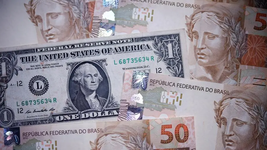 Dollar steady, Brazilian real slides on tariff threat; bitcoin near record high