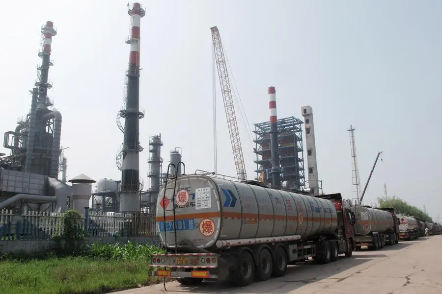 FILE PHOTO: A Shandong Haiyou Petrochemical Group refinery is seen in Ju county, Shandong province, China July 25, 2018. Picture taken July 25, 2018. REUTERS/Dominique Patton. , Reuters