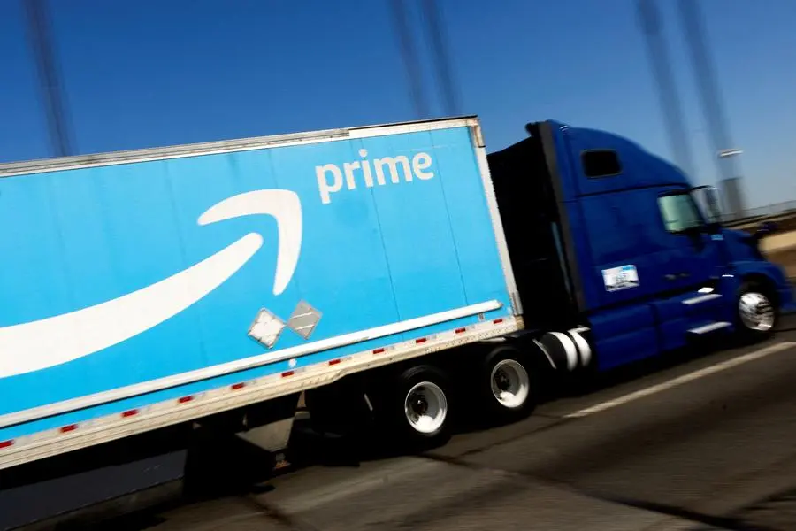 FILE PHOTO: An Amazon Prime truck is pictured as it crosses the George Washington Bridge on Interstate Route 95 during Amazon\\'s two-day \"Prime Early Access Sale\" shopping event for Amazon members in New York City, New York, U.S., October 11, 2022. REUTERS/Mike Segar/File Photo , Reuters/REUTERS