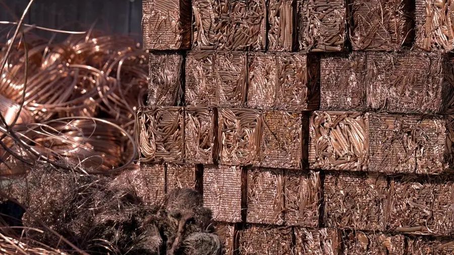 Shanghai copper hovers below record high as Chinese demand picks up, dollar weakens