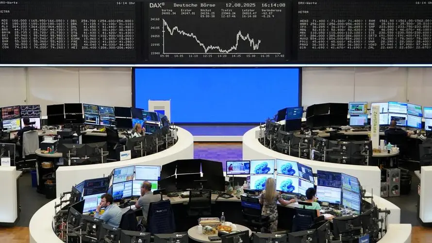 European shares near two-week highs on Fed rate cut hopes