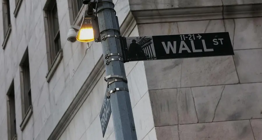 Wall St subdued as China trade uncertainty lingers; Alphabet gains