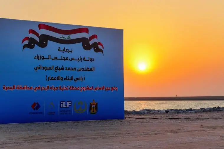 A billboard is displayed at the groundbreaking site of a major seawater desalination project, around $4 billion plant which will be constructed by China\\'s PowerChina in partnership with an Iraqi company, in Basra, Iraq, July 23, 2025. REUTERS/Mohammed Aty. , Reuters