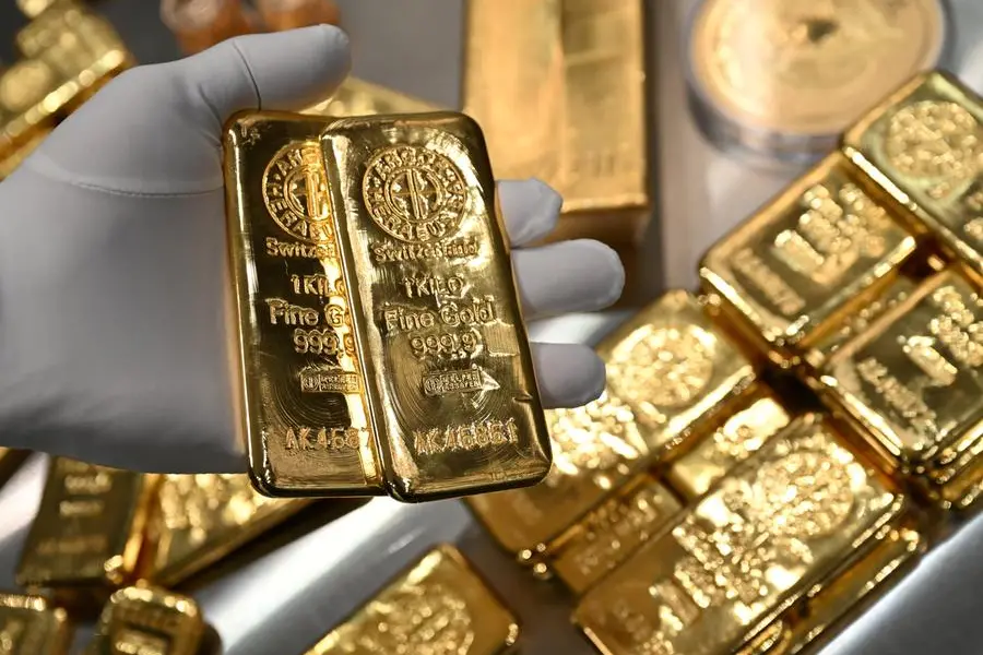 Gold bars are stacked in the safe deposit boxes room of the Pro Aurum gold house in Munich, Germany, January 10, 2025. REUTERS/Angelika Warmuth. , Reuters