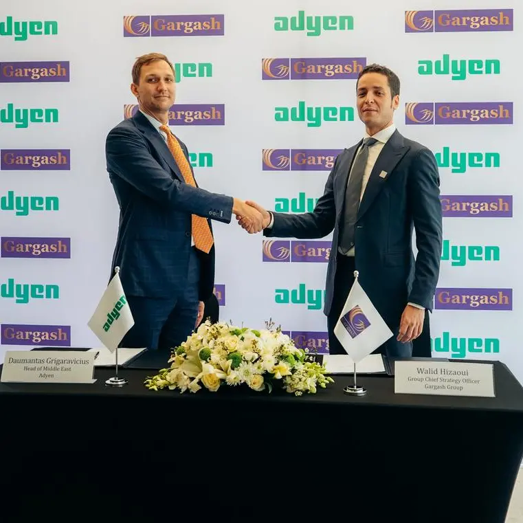 مجموعة قرقاش تتعاون مع أدين لإحداث نقلة نوعية في حلول الدفع