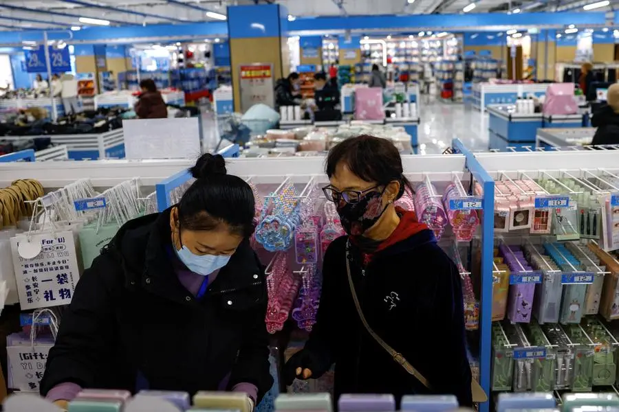 Customers shop at the Wankelai store in Beijing, China February 27, 2025. REUTERS/Tingshu Wang. Image used for illustrative purpose. , Reuters