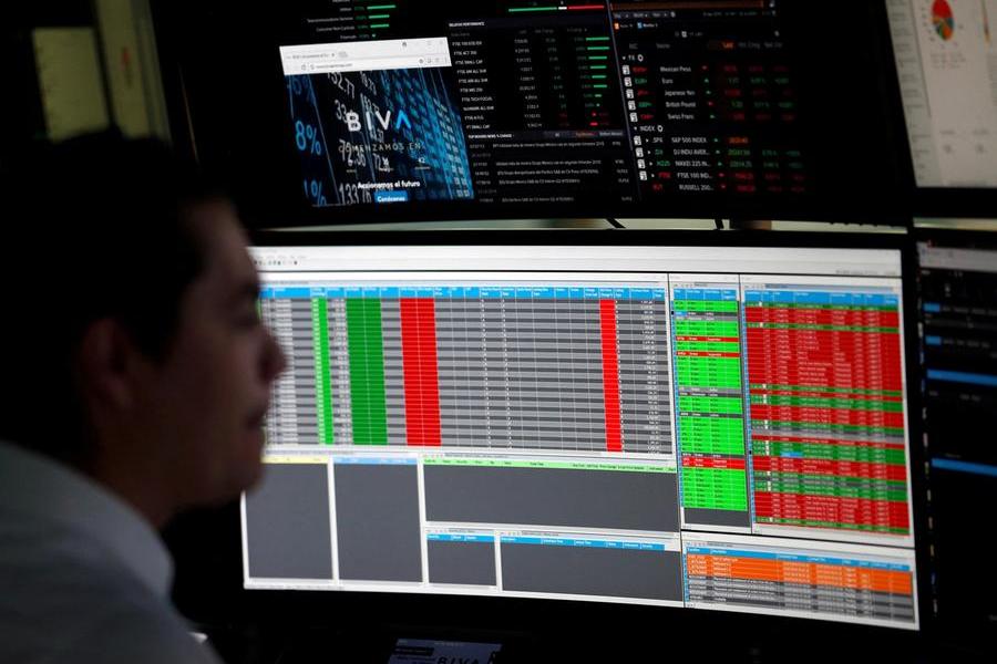 Stocks retreat from record high, dollar higher after Fed keeps rates steady