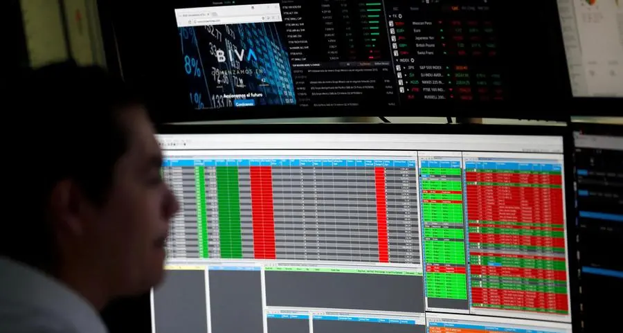 Stocks retreat from record high, dollar higher after Fed keeps rates steady