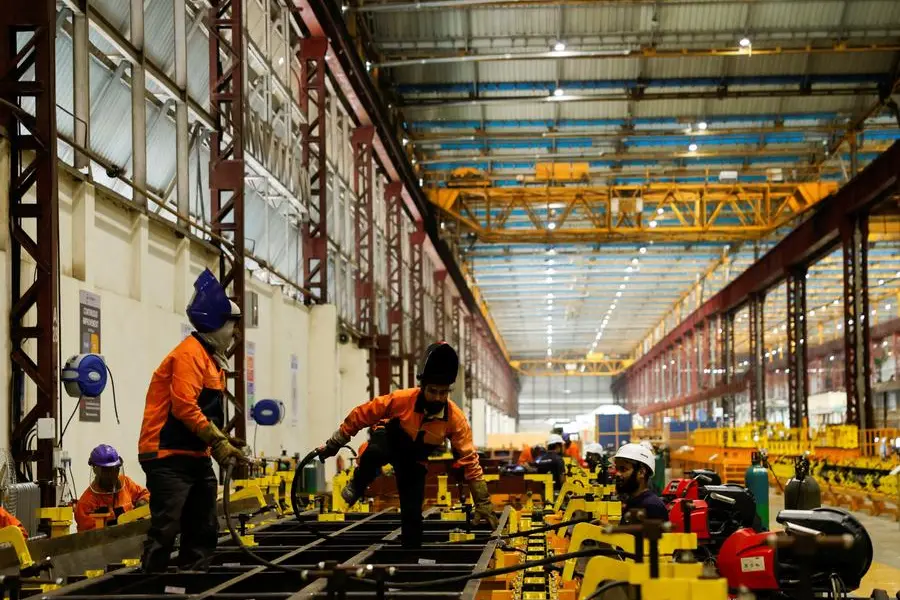 Workers work on a rail component inside a manufacturing unit of Titagarh Rail Systems Ltd. (TRSL) in Uttarpara, India, June 18, 2025. REUTERS/Sahiba Chawdhary. , Reuters