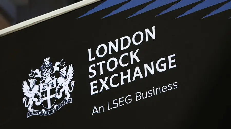 UK shares gain as investors assess company news, economic data