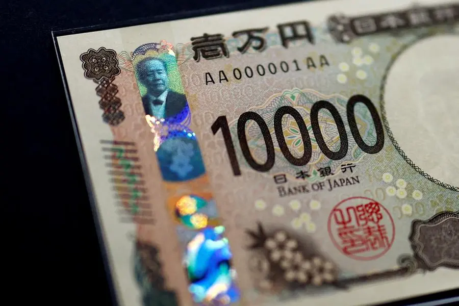 FILE PHOTO: Holograms, which show different images and colours depending on the angle at which they are viewed, are seen on the new Japanese 10,000 yen banknote as the new note is displayed at a currency museum of the Bank of Japan, on the day the new notes of 10,000 yen, 5,000 yen and 1,000 yen went into circulation, in Tokyo, Japan July 3, 2024. REUTERS/Issei Kato/Pool/File Photo , Reuters/REUTERS
