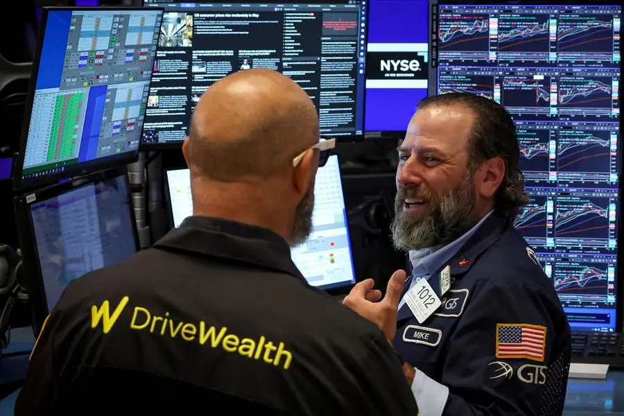 Traders work on the floor at the New York Stock Exchange (NYSE) in New York City, U.S., June 11, 2025. REUTERS/Brendan McDermid. , Reuters