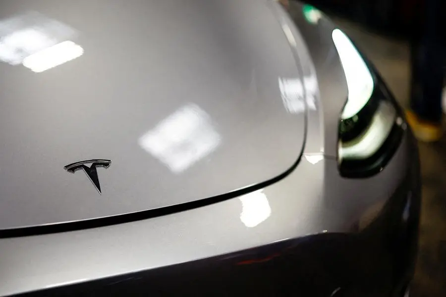 FILE PHOTO: The Tesla logo is seen on a car at the Paris Games Week (PGW), a trade fair for video games in Paris, France, October 27, 2024. REUTERS/Sarah Meyssonnier/File Photo , Reuters/REUTERS