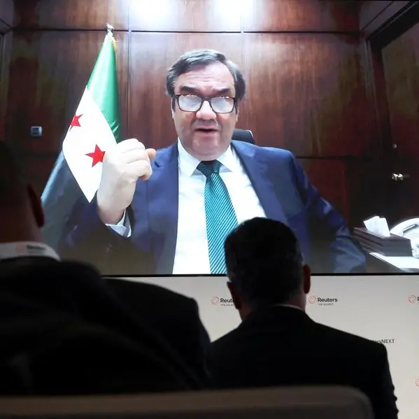 Syria's growth accelerates as sanctions ease, refugees return, central bank chief says