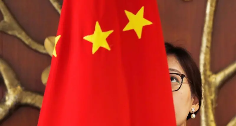 China approves Qatar sovereign fund to buy a tenth of its top asset manager