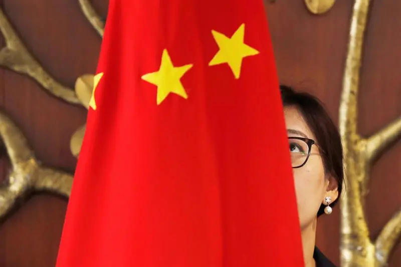 China approves Qatar sovereign fund to buy a tenth of its top asset manager