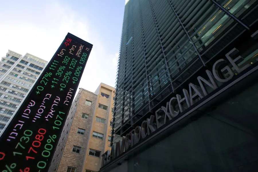 FILE PHOTO: An electronic board displaying market data is seen at the entrance of the Tel Aviv Stock Exchange, in Tel Aviv, Israel January 29, 2017. REUTERS/Baz Ratner. , Reuters