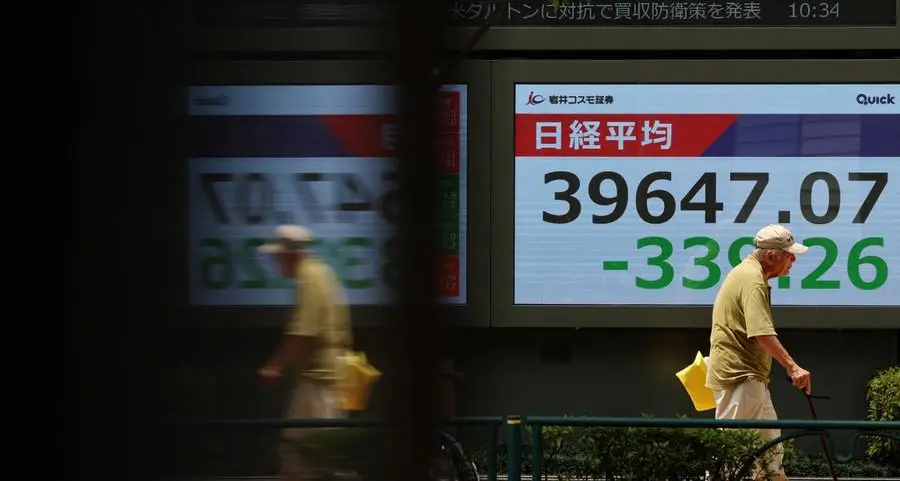 Asian stocks wobble, dollar edges down with tariff deadline in focus
