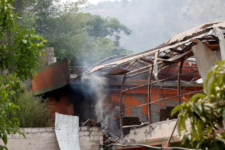Smoke rises from Bilal Mosque after it was hit by an Indian strike in Muzaffarabad, the capital of Pakistan-administered Kashmir, May 7, 2025. REUTERS/Akhtar Somroo. , Reuters